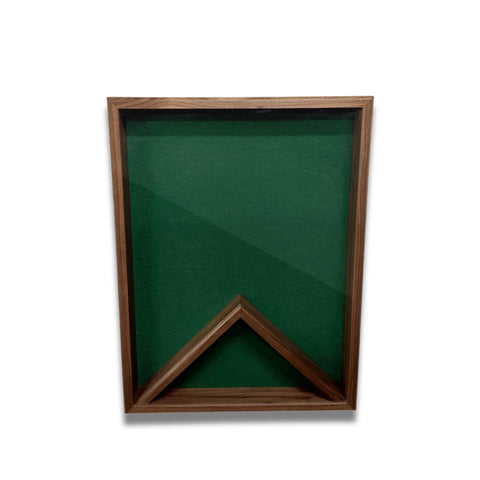 Front view of a walnut 18x24 vertical shadow box with green felt backing and no flag inside