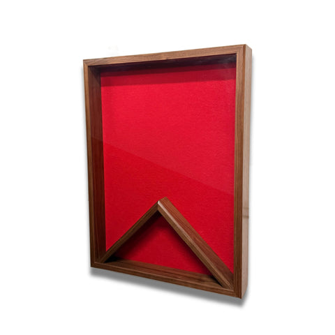 Walnut 18x24 vertical shadow box shown at a slight right angle with red felt backing and no flag inside