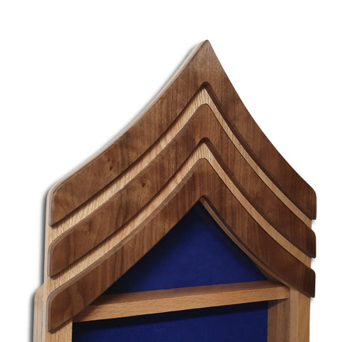 Military retirement shadow box for US Air Force Chief Master Sergeant. Made of real Oak and Walnut hardwood. Holds a 3'x5' folded flag. Close up of the top 3 upper stripes.