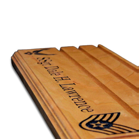 Close-up of coin display grooves and custom engraving on The Sentinel