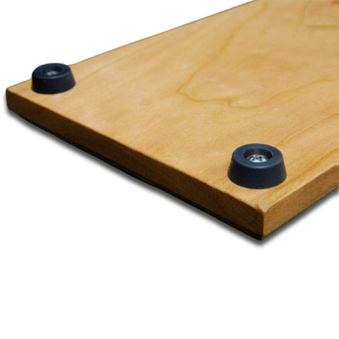 Close-up of protective rubber feet on the underside of The Sentinel coin display